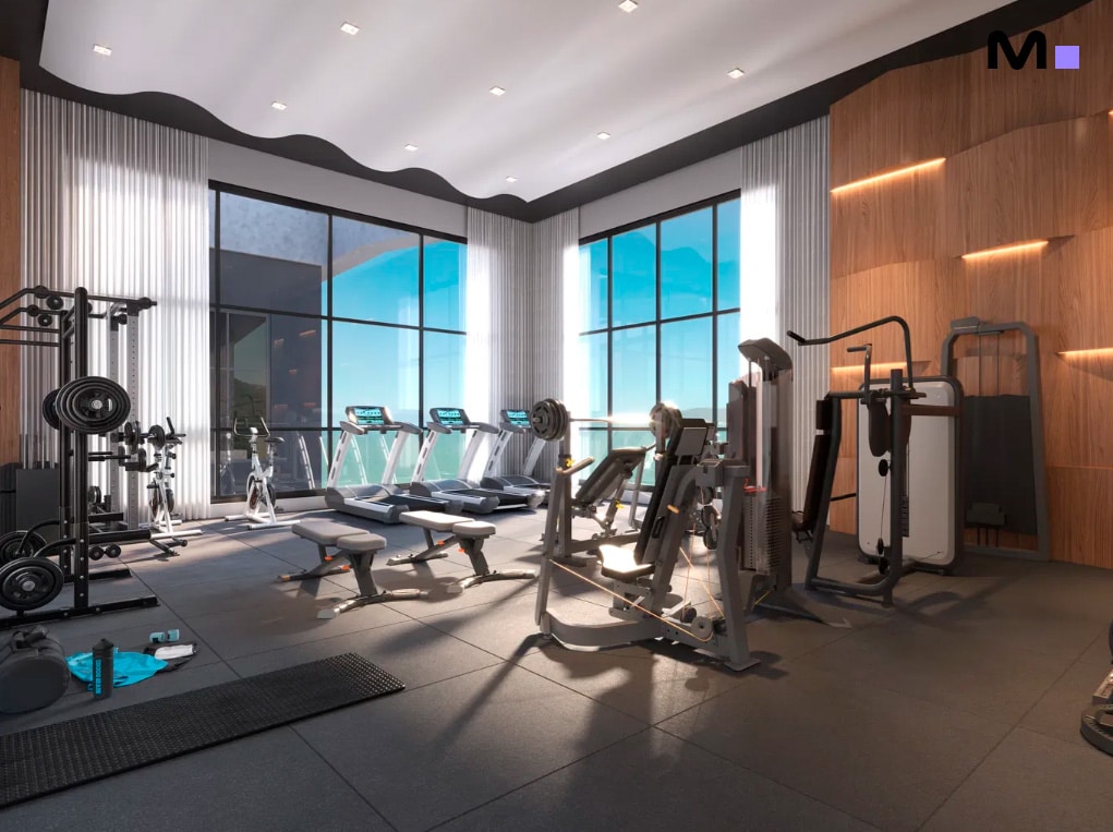 Academia moderna e bem equipada no Bayuquan Residence. Esteiras, pesos e luz natural abundante.