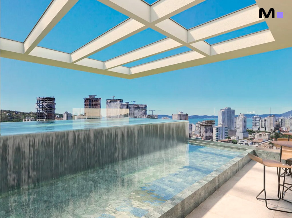 Piscina com borda infinita no Vale Jardon Residence, com vista para a cidade.