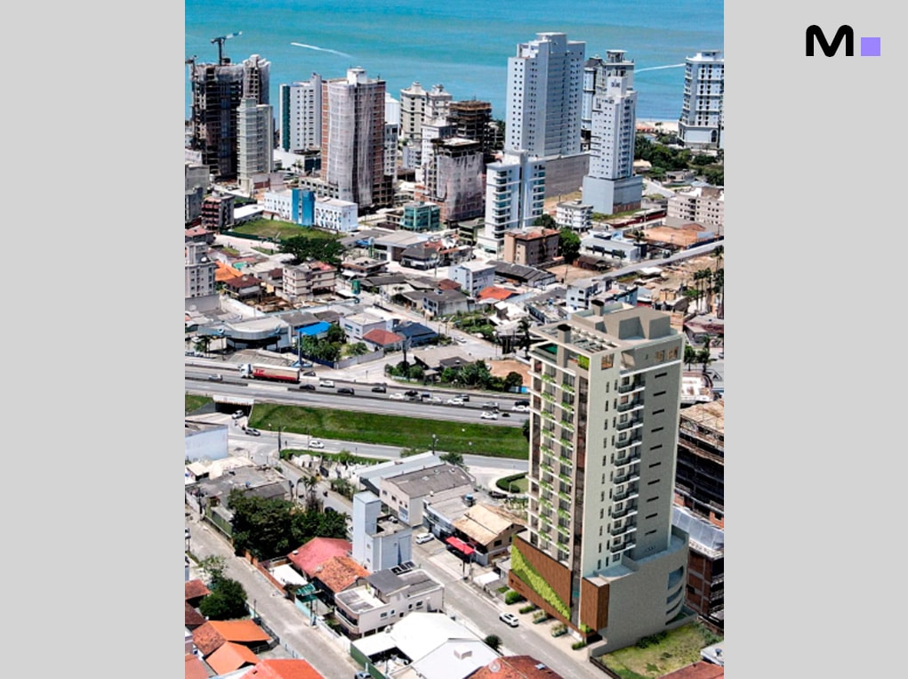 Vale Jardon Residence em Itapema: Visão aérea do edifício moderno e da cidade.