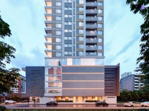 Edifício residencial Le Monarque Residence, com design moderno e elegante. Fachada imponente e janelas amplas.