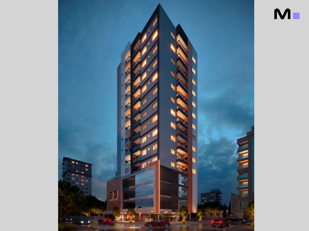 Edifício residencial moderno iluminado ao anoitecer. Grand View Residence.