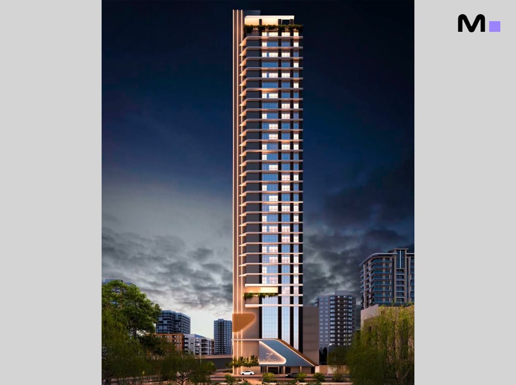 Edifício alto e moderno Piatto Residenziale, com iluminação noturna e design elegante.