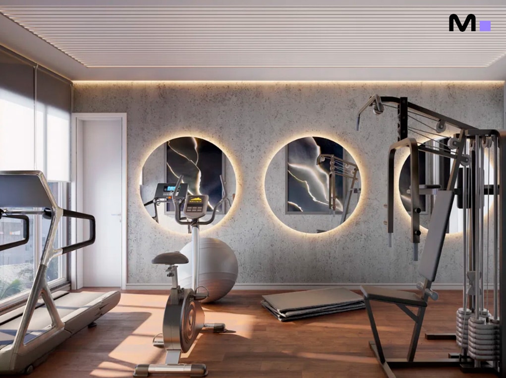 Academia moderna no Grand View Residence com esteira, bicicleta ergométrica e estação de musculação.