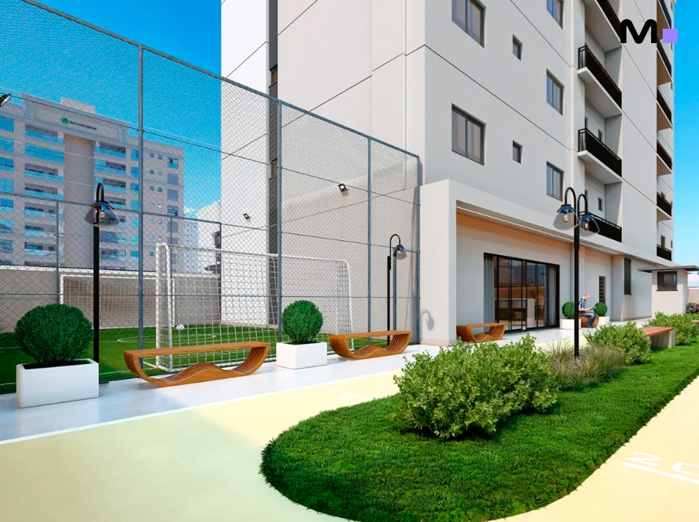 Área de lazer moderna com quadra esportiva e paisagismo exuberante.