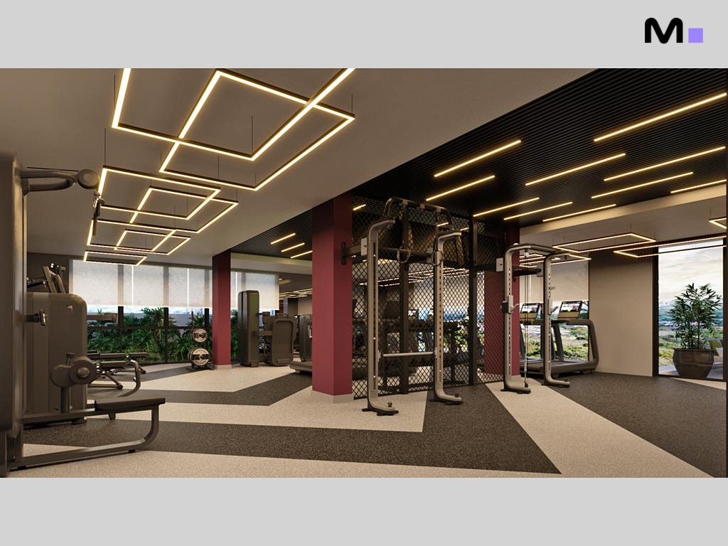 Academia moderna e bem iluminada no Habitat Praia Brava. Equipamentos de ginástica e vista para área verde.