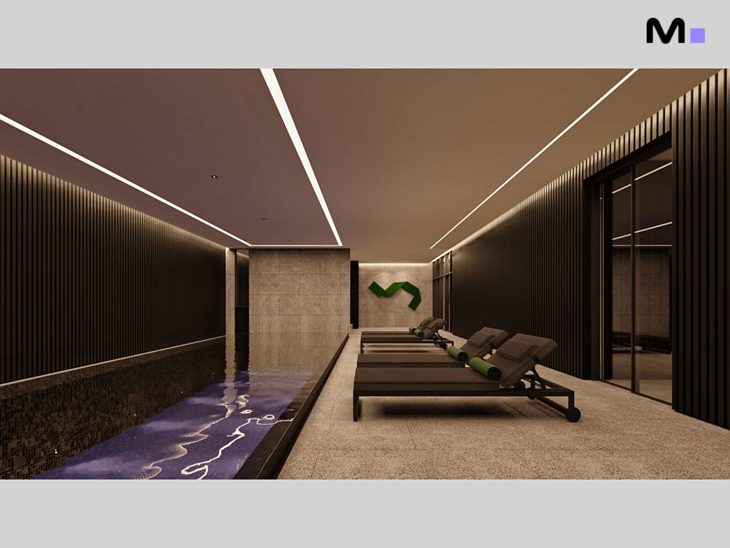 Piscina interna do Habitat Praia Brava com espreguiçadeiras e iluminação moderna.