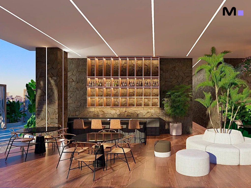 Interior luxuoso do Elohim Residencial Club com bar, mesas e decoração moderna.
