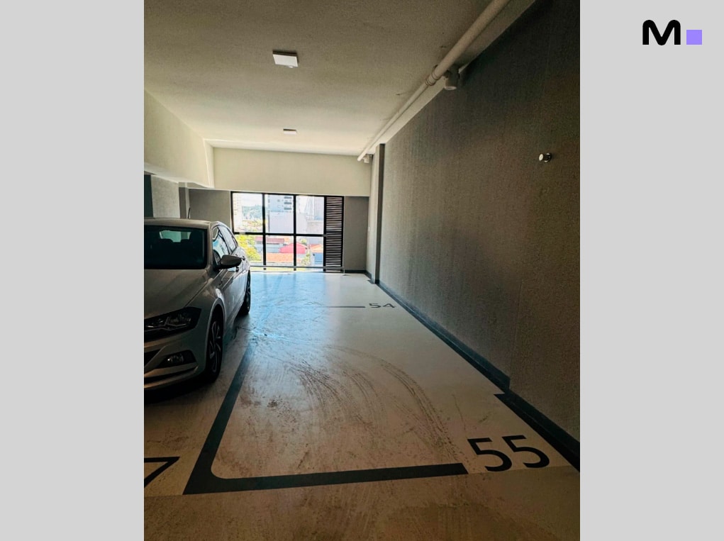 Garagem no Edifício Ocean Cay com carro estacionado na vaga número 55.