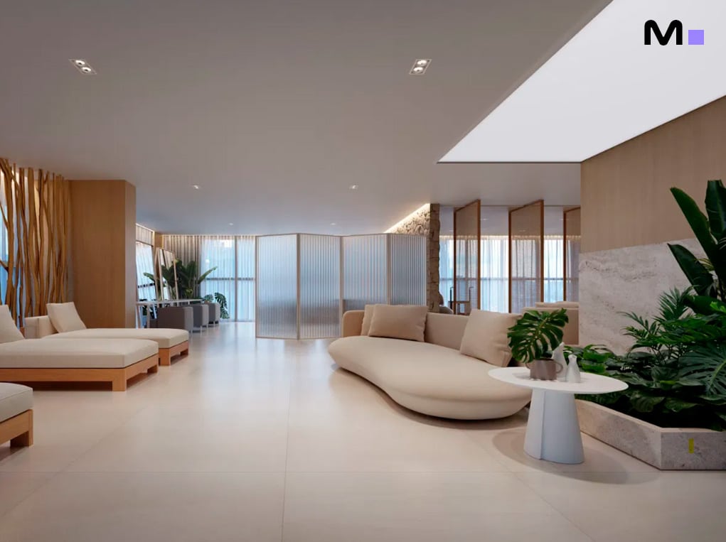 Interior moderno e minimalista do Down Town by Housi com sofás, plantas e divisórias de vidro.