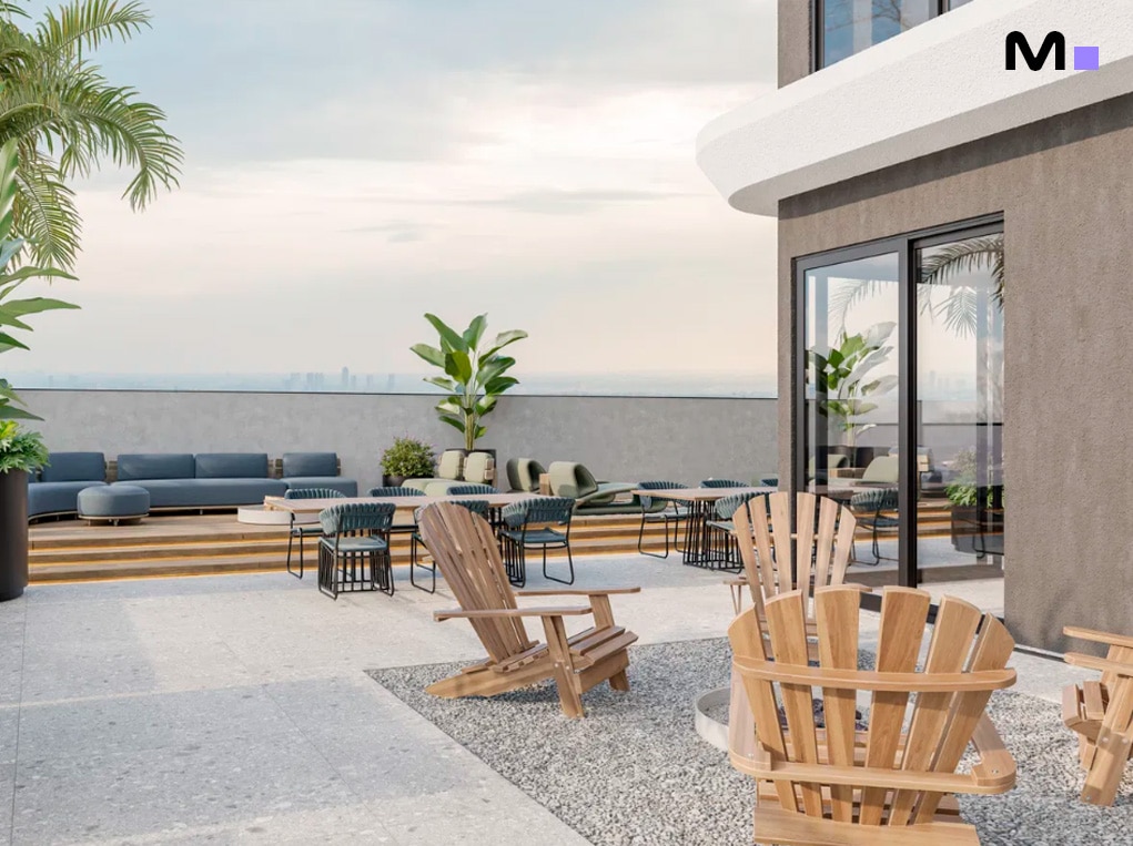 Terraço do Axion Towers com cadeiras de madeira e área de estar moderna.