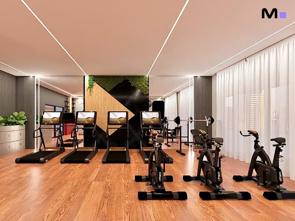 Academia moderna no Elohim Residencial Club com esteiras e bicicletas ergométricas.