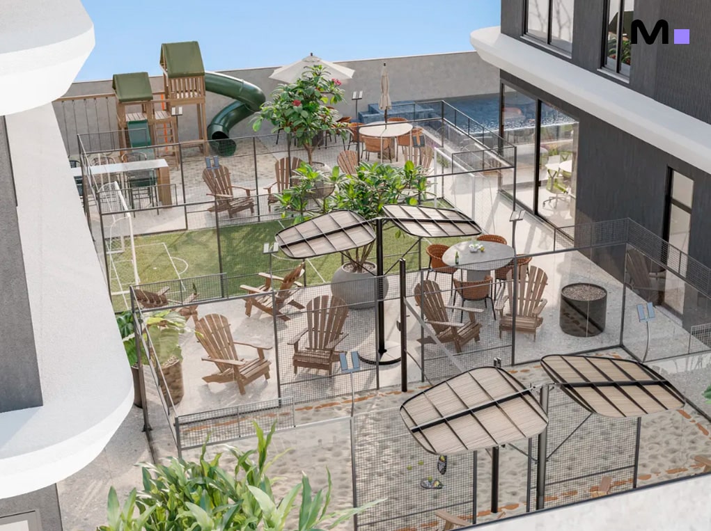 Área de lazer do Axion Towers com playground, mesas e cadeiras em um espaço ao ar livre.