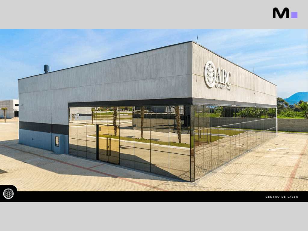 Fachada moderna do ABC Business Park com amplas janelas refletivas.