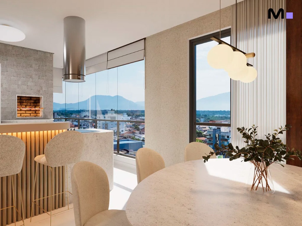 Cozinha moderna e iluminada com vista da Minuannon Residencial. Mesa redonda e cadeiras bege.