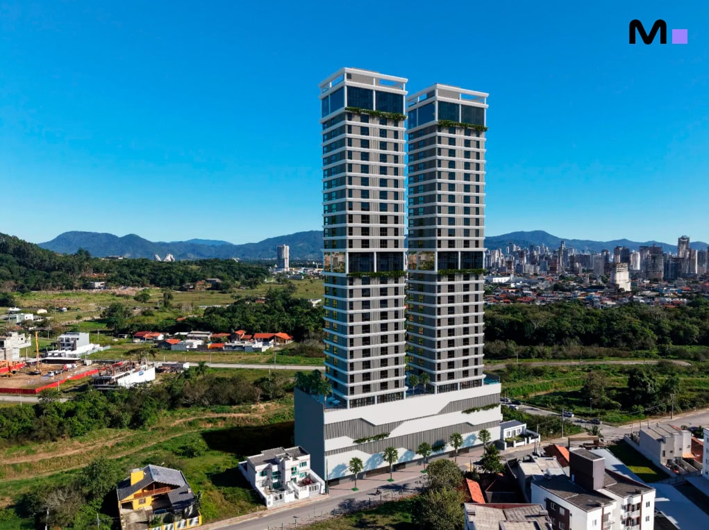 Axion Towers: Vista aérea de dois arranha-céus modernos em Balneário Camboriú, SC.