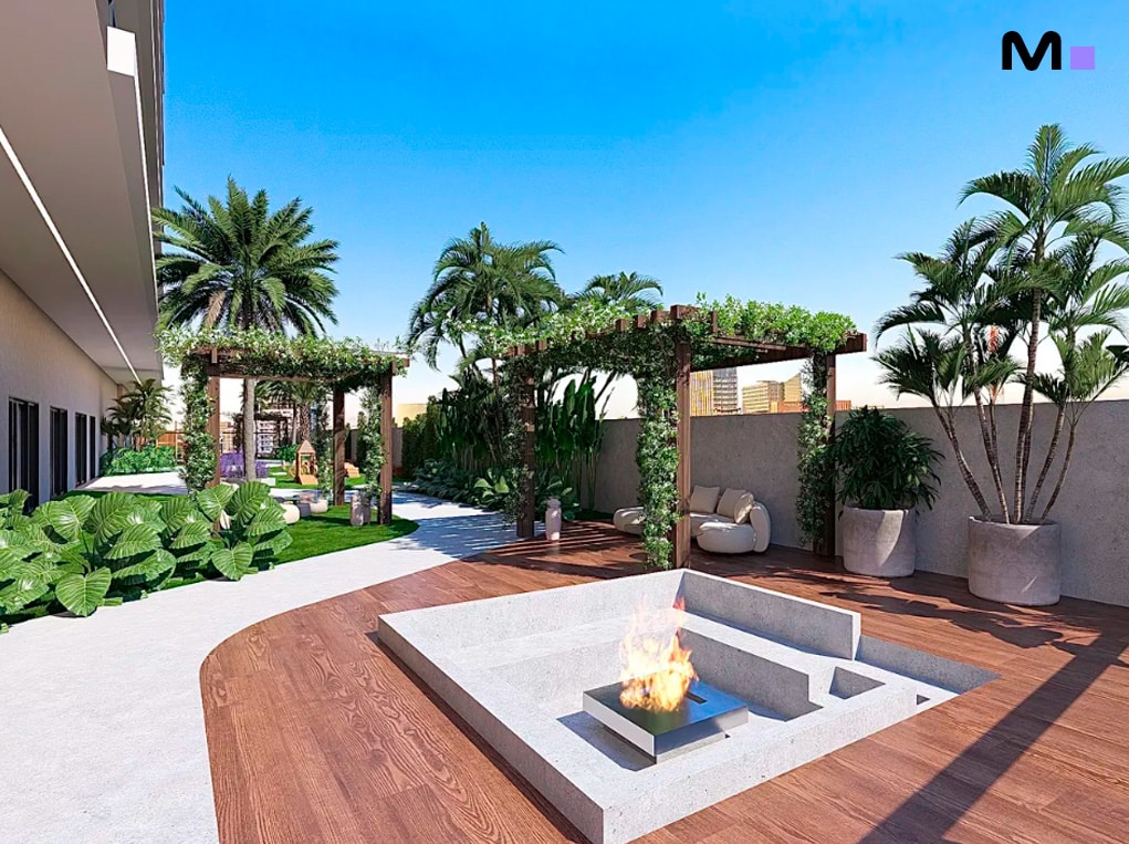 Área de lazer do Elohim Residencial Club com fogo, pergolados e paisagismo tropical.