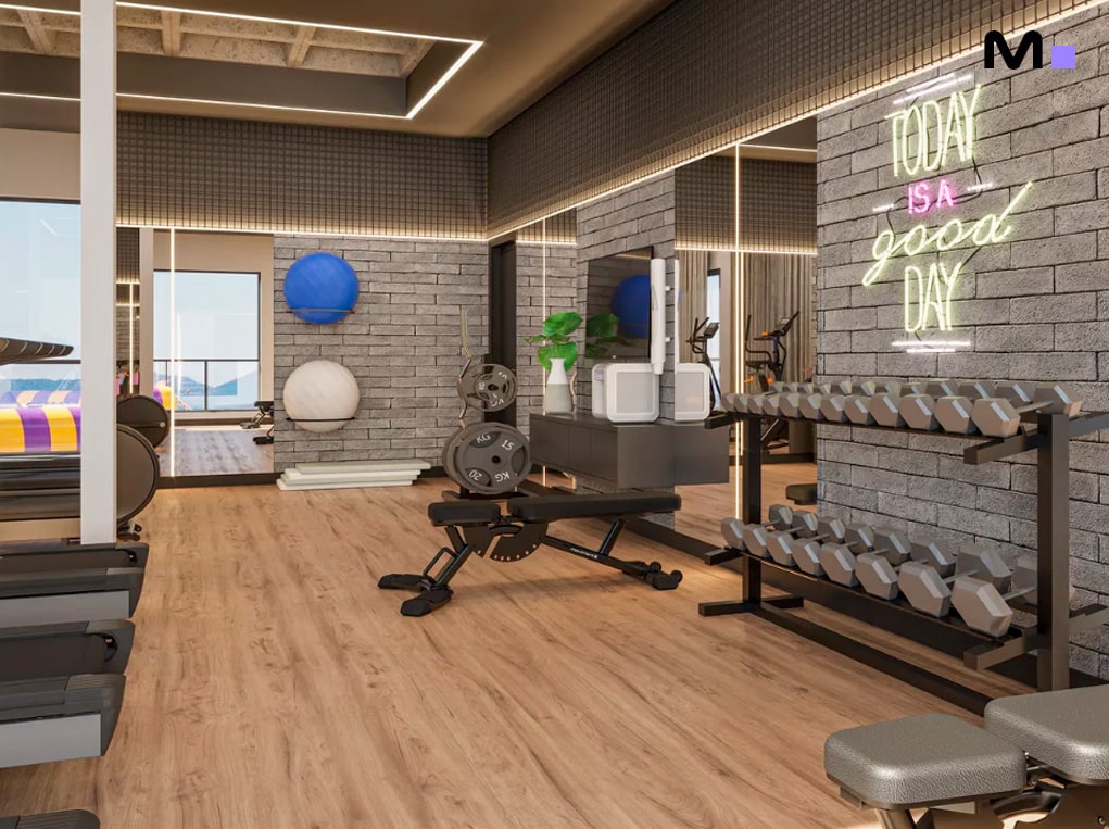 Academia residencial Minuannon com halteres, bola de pilates e espelhos.