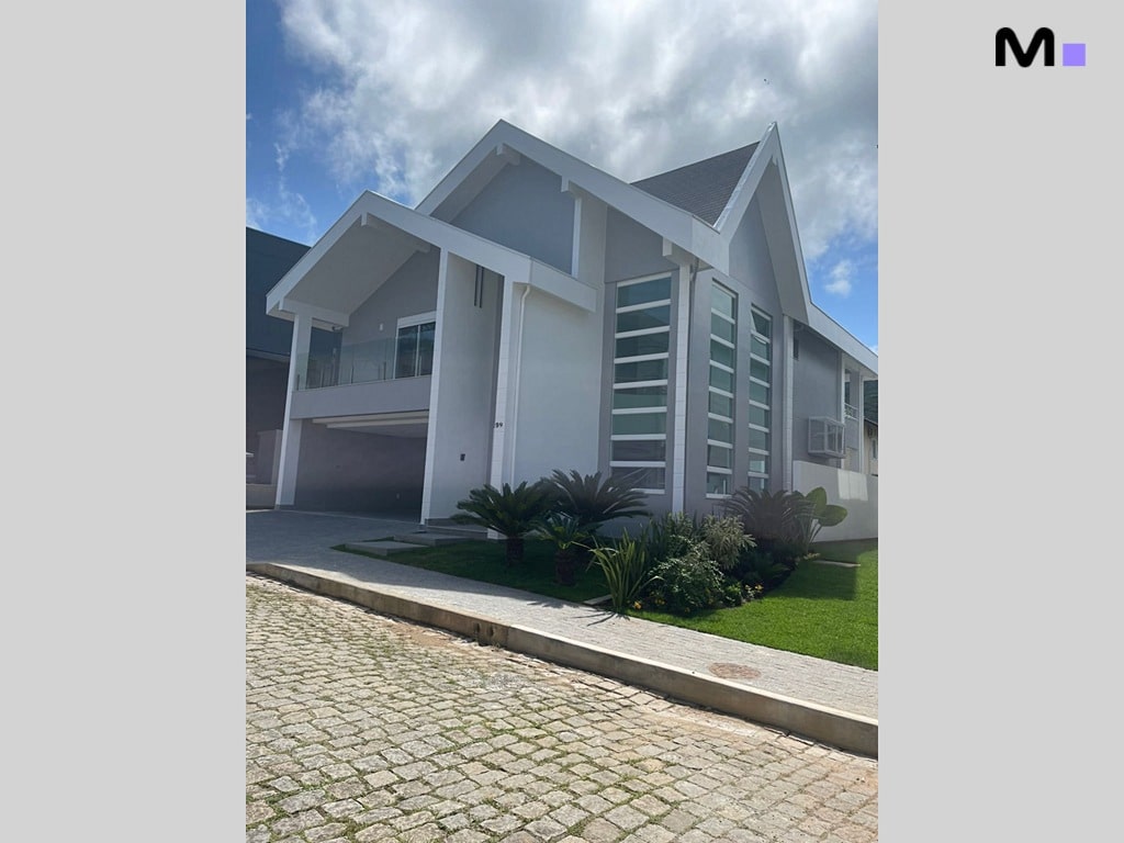 Casa moderna no Condomínio House Haras com arquitetura contemporânea e paisagismo exuberante.