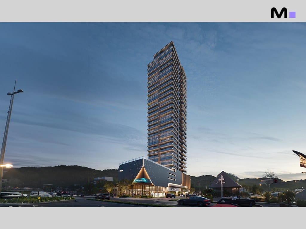 Residências Metropolitan Modern: Vista externa do prédio alto e moderno ao entardecer.