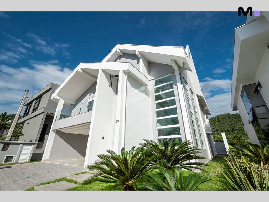 Casa moderna no Condomínio House Haras, com design arquitetônico e paisagismo exuberante.