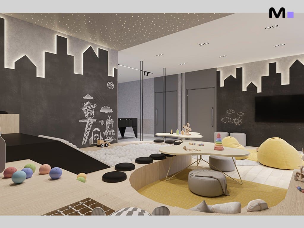 Sala de jogos moderna com desenho de cidade na parede e piscina de bolinhas. Residências Metropolitan Modern.