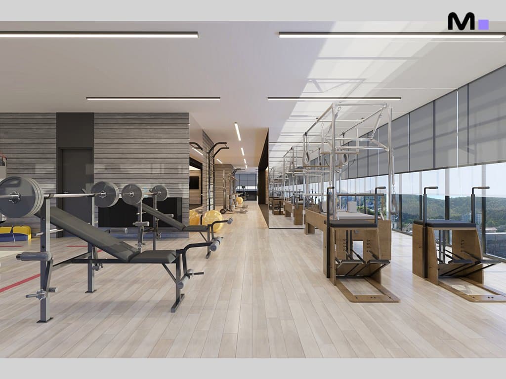 Academia moderna em Metropolitan Modern Residences com equipamentos de musculação e pilates.