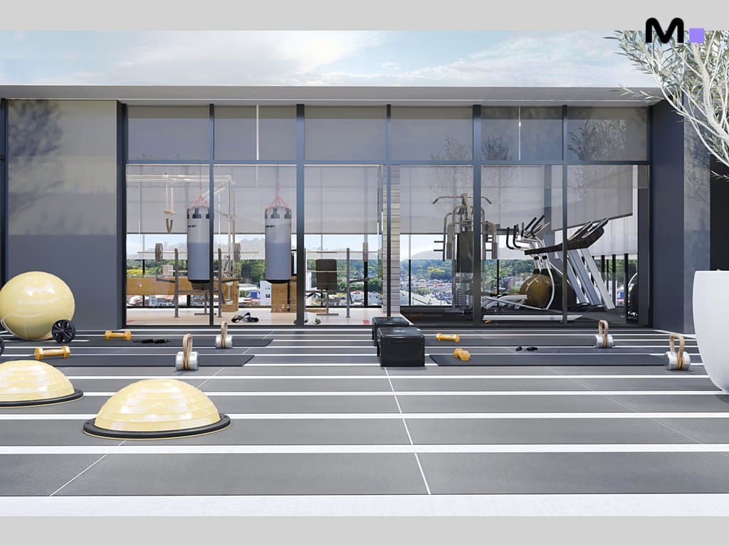 Academia moderna em Metropolitan Modern Residences com equipamentos de ginástica e vista panorâmica.