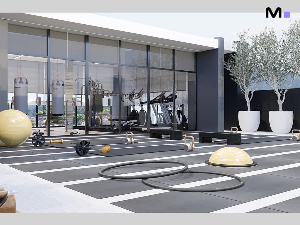 Equipamentos de ginástica ao ar livre no Metropolitan Modern Residences. Academia moderna e bem iluminada.