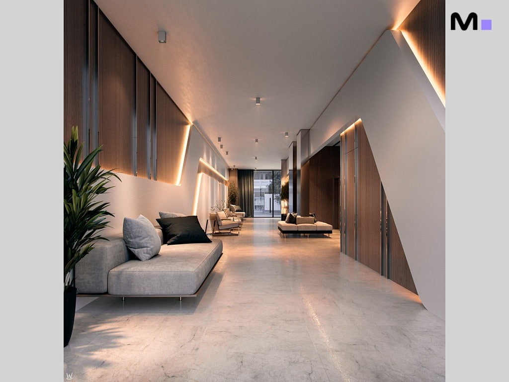 Interior elegante do Nilo Residence com sofás, iluminação suave e piso de mármore.