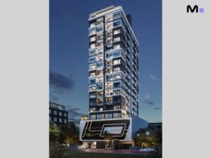 Edifício Amalfi Residence em destaque contra o céu noturno. Arquitetura moderna e iluminação vibrante.