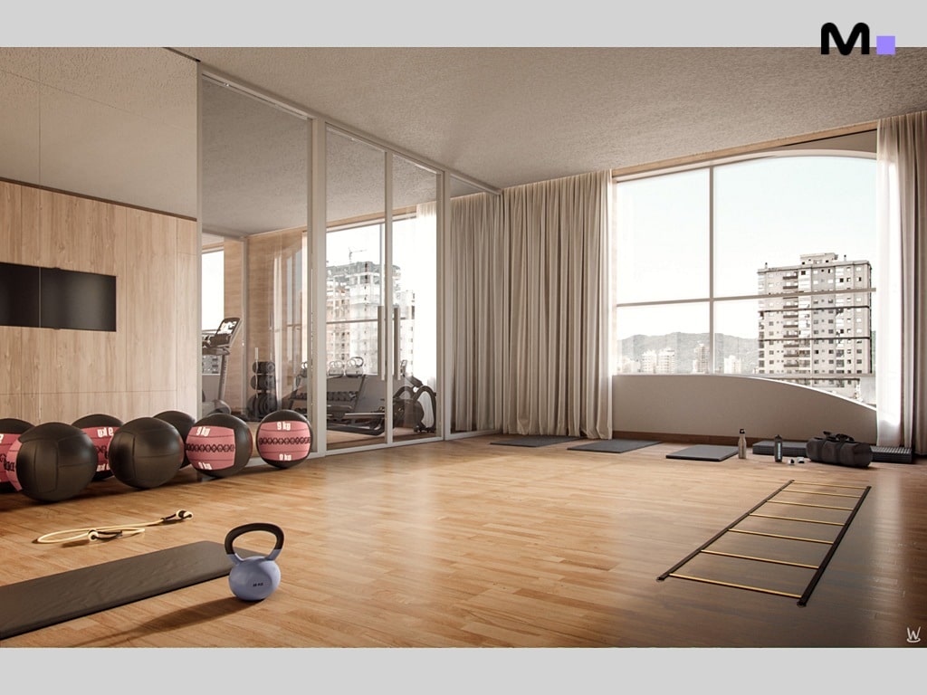 Academia residencial Nilo Residence com equipamentos de ginástica e vista panorâmica da cidade.