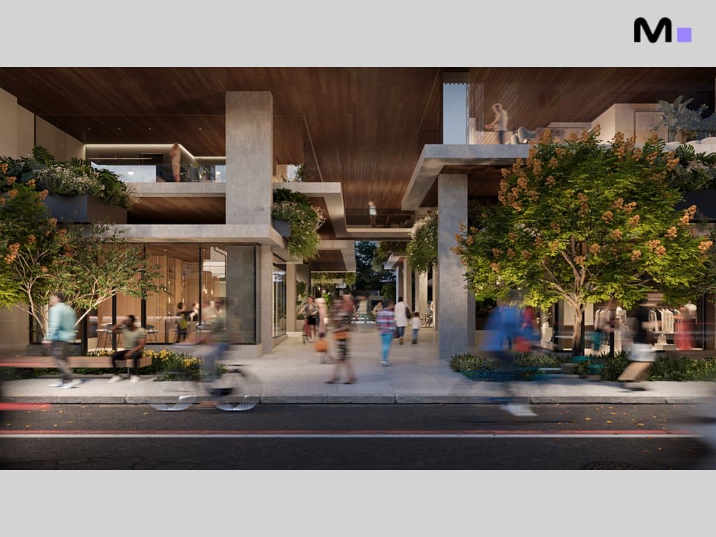 Fachada moderna do Vibra Phacz Home com pessoas caminhando e árvores floridas.