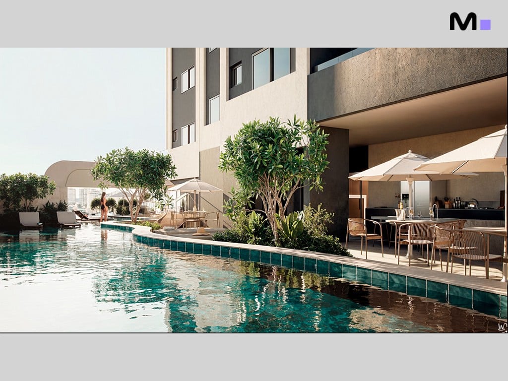 Piscina do Nilo Residence com área de lazer e espreguiçadeiras, refletindo o design moderno do prédio.