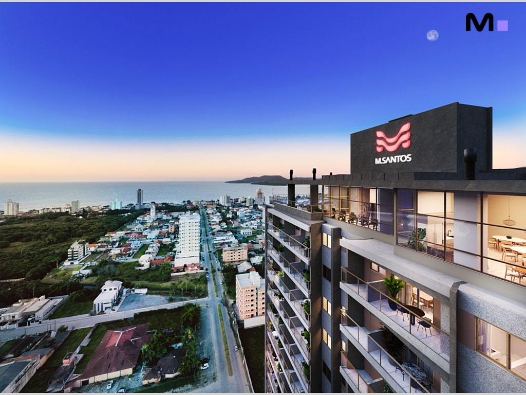 Vista aérea do Quest Residence, edifício moderno à beira-mar.