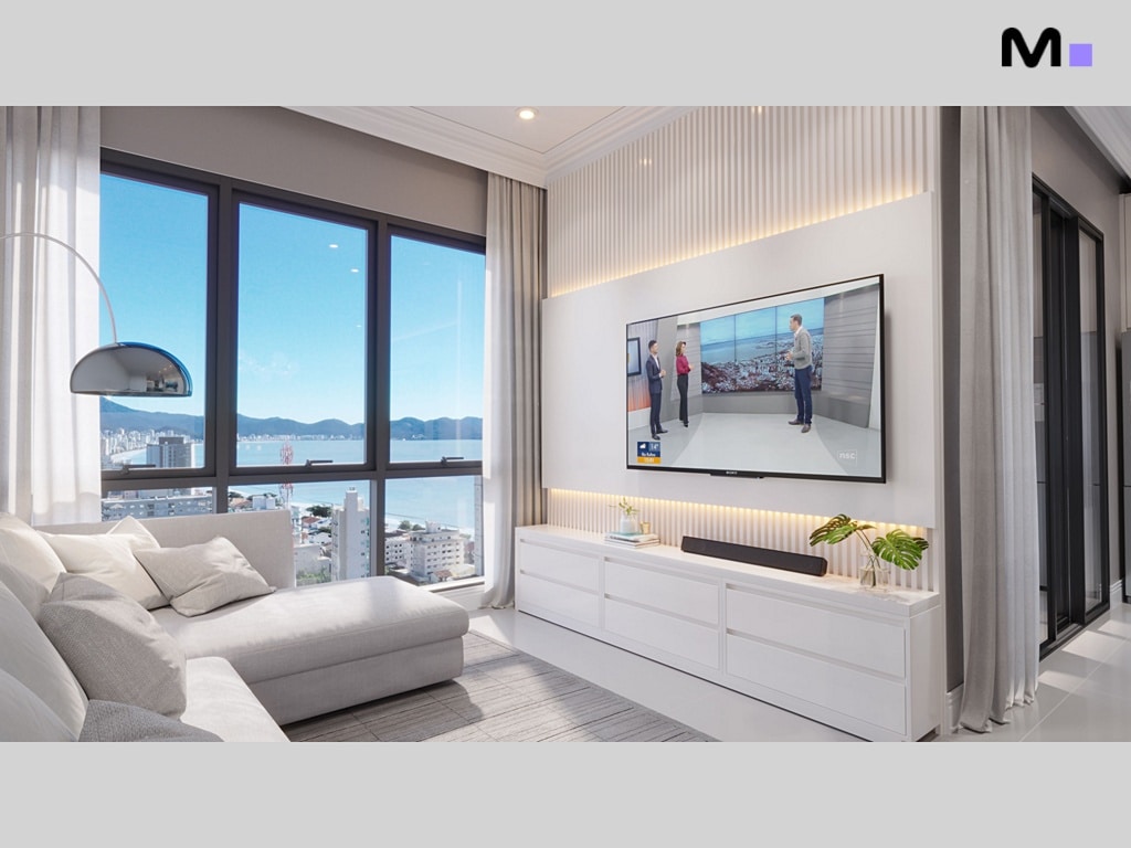 Sala moderna do Mont Blanc Residence com TV, sofá confortável e vista panorâmica da cidade.