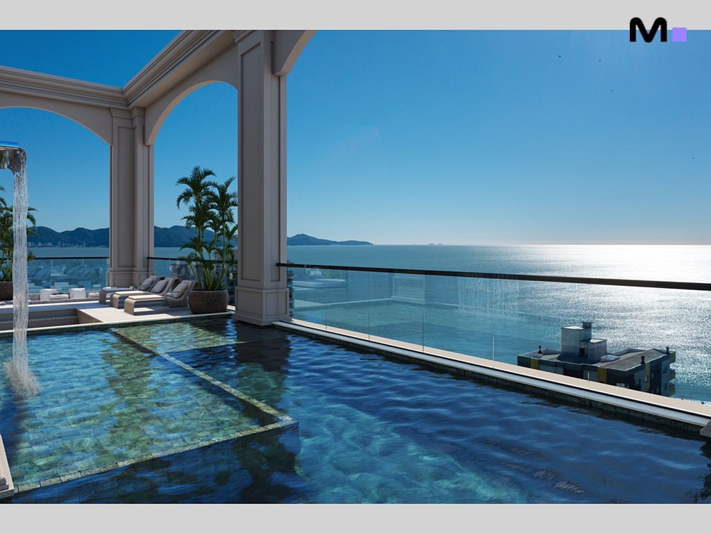 Piscina luxuosa no Mont Blanc Residence com vista para o mar azul.