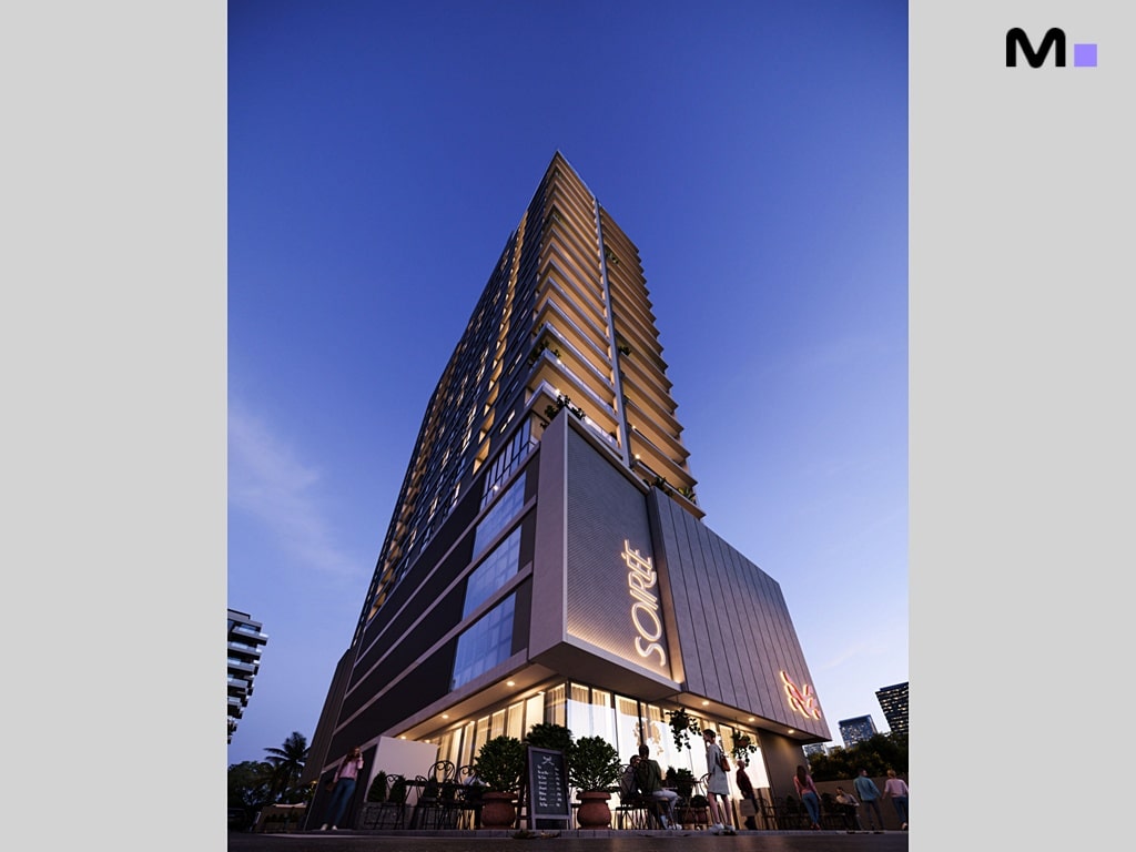 Edifício alto com a fachada "Soirée" iluminada à noite. Arquitetura moderna e elegante.