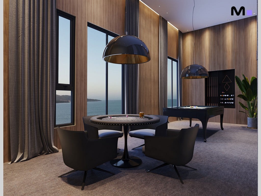 Elegante sala de jogos com mesa de carteado, sinuca e vista para o mar. Perfeito para uma soirée sofisticada.