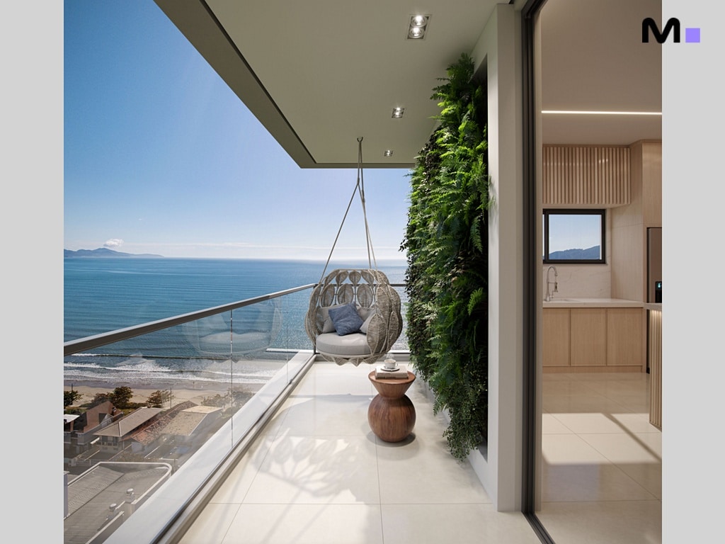 Varanda moderna com vista para o mar, cadeira suspensa e jardim vertical.