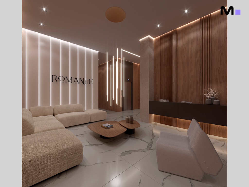 Hall de entrada da Romanée Residence com sofá bege, piso de mármore e iluminação moderna.