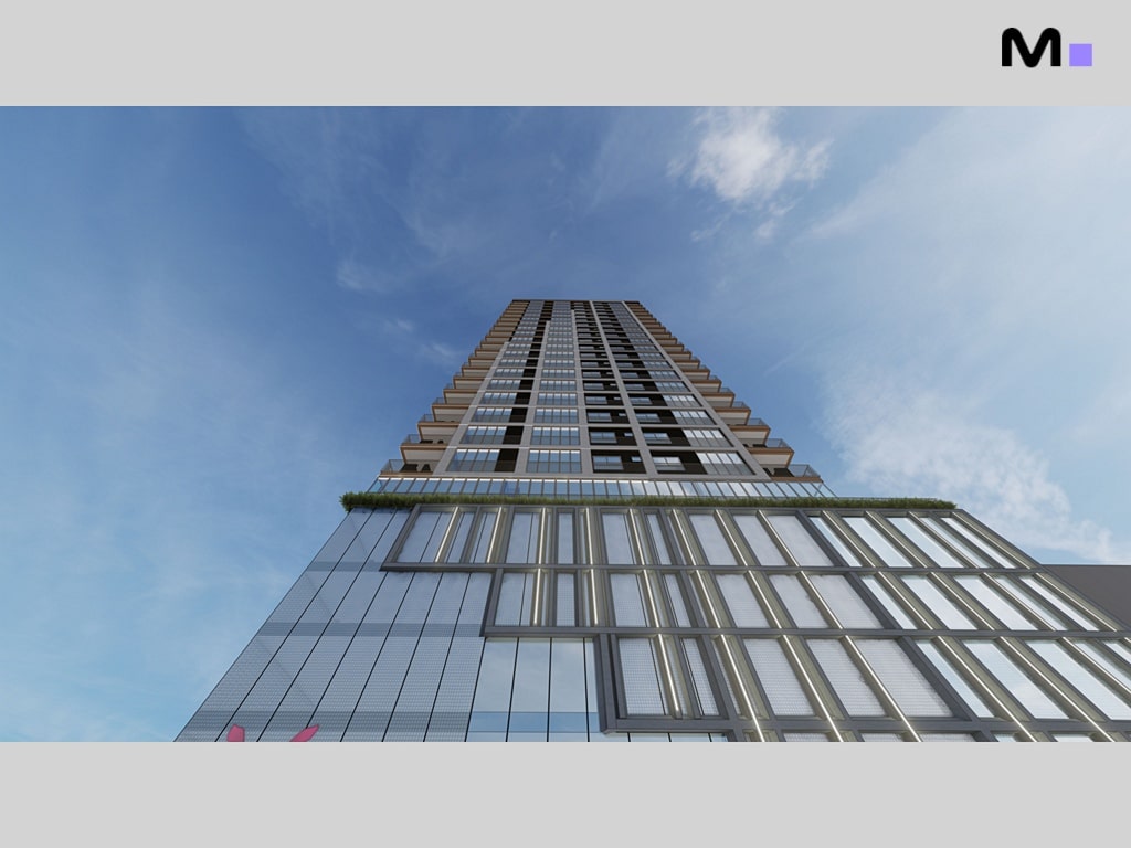 Residência Vega Apartments: Vista angular de um prédio alto com janelas e varandas contra um céu azul.