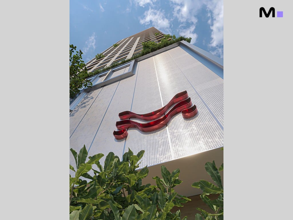 Fachada do Vega Apartments Residence com logo vermelho estilizado e vegetação.