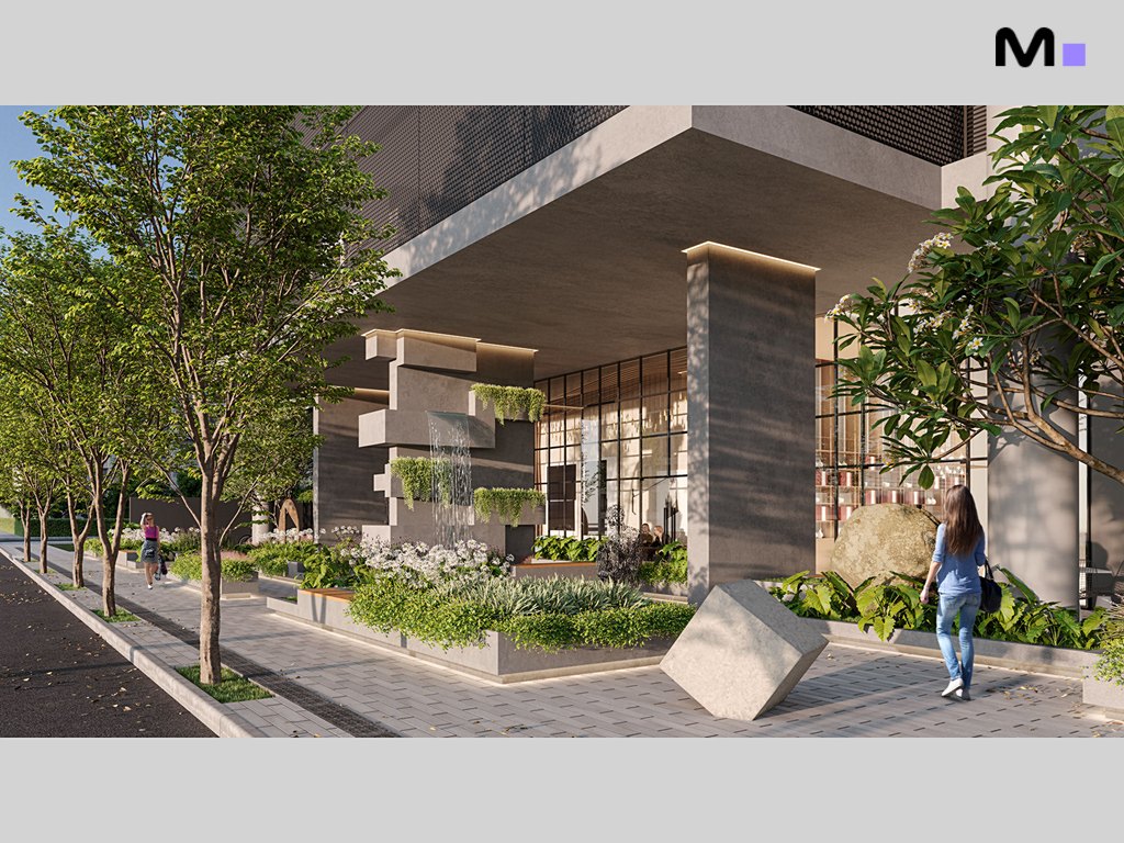 Entrada do Hera Home Residence com paisagismo, fonte e pessoas caminhando.