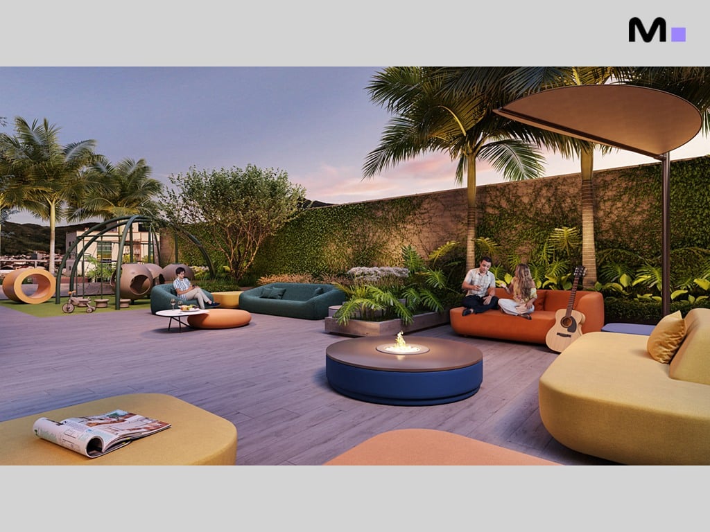 Espaço de lazer ao ar livre no Hera Home Residence com sofás coloridos, fogueira e playground.