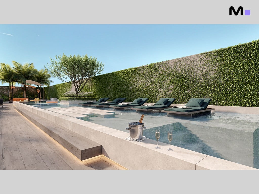 Piscina luxuosa no Hera Home Residence com espreguiçadeiras e área de relaxamento.