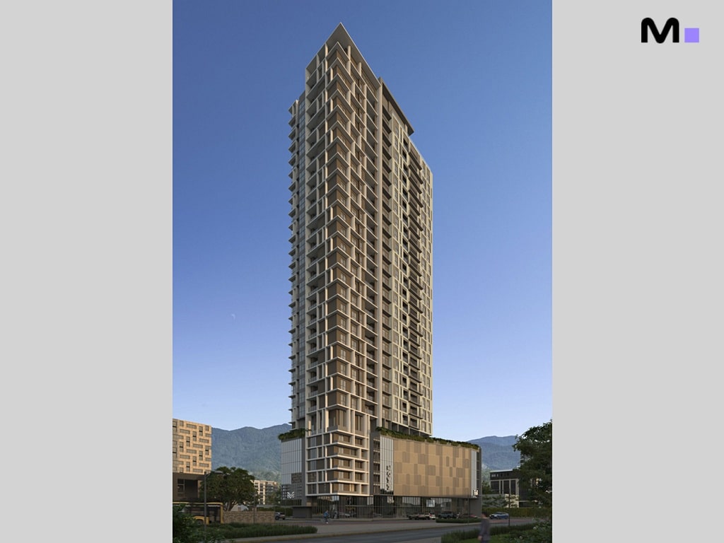 Edifício alto e moderno do Hyde Residence sob um céu azul claro.