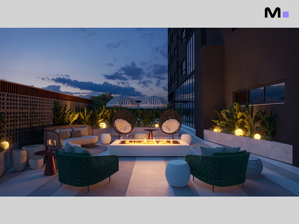 Área de lazer noturna do Zion Tower com sofás, cadeiras suspensas e lareira moderna.