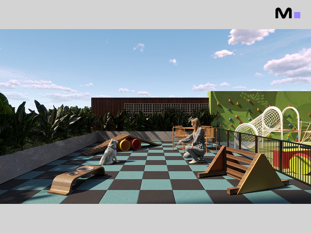 Área de lazer para pets no Zion Tower com mulher e cachorro em espaço com brinquedos e grama sintética.