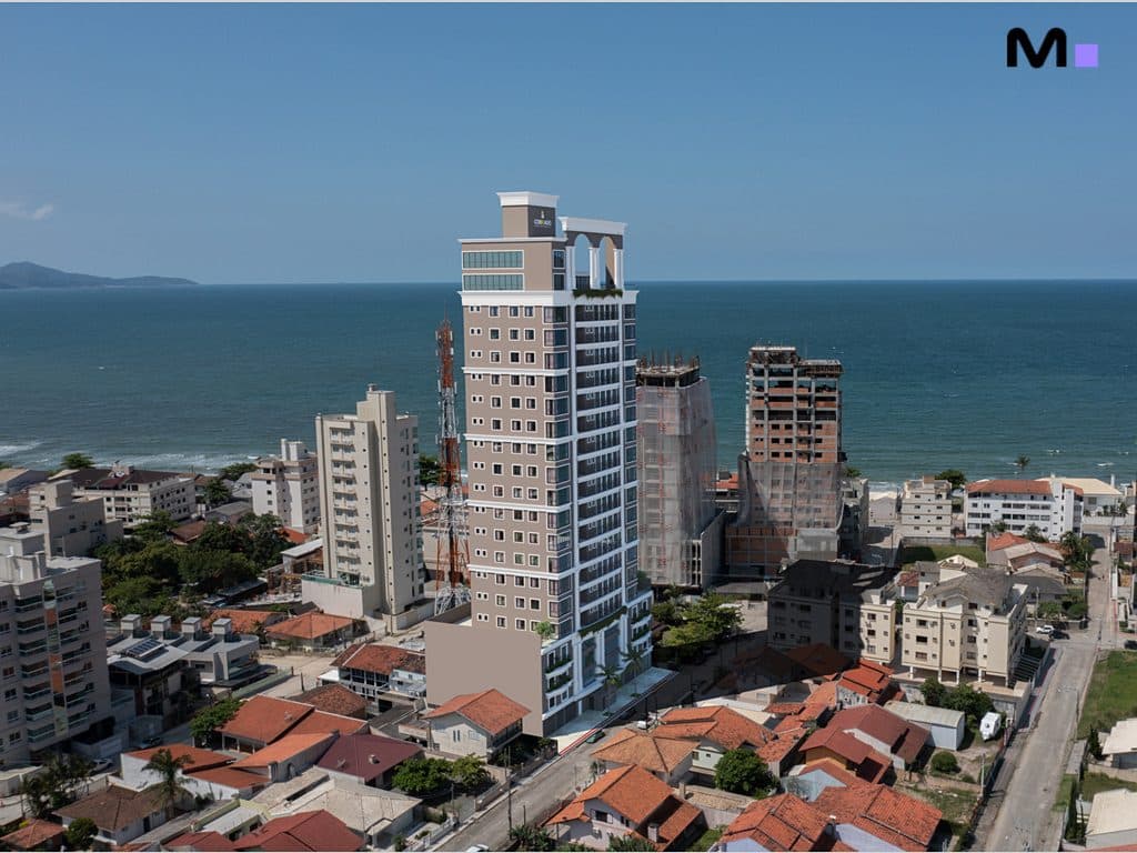 Edifício Palazzo Reale em Itapema, com vista para o mar e outros prédios em construção.