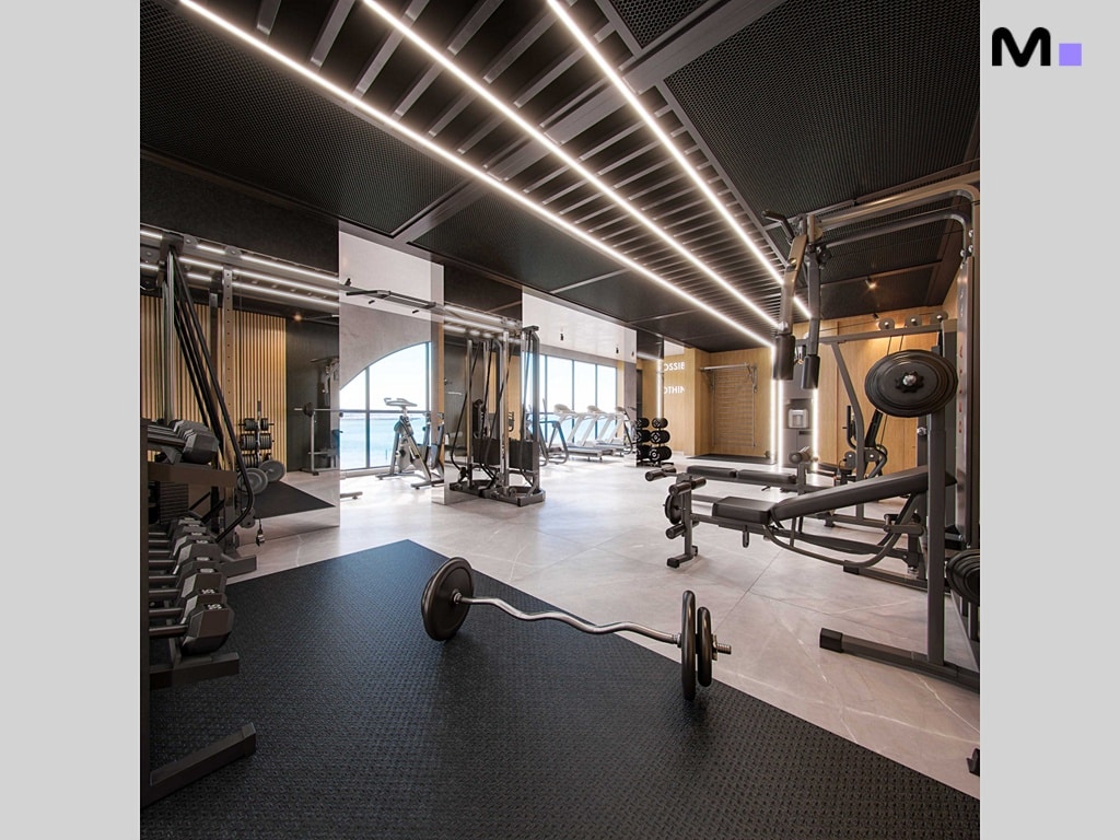 Academia moderna e bem equipada no Hudson Park Residence. Equipamentos de ginástica e iluminação elegante.